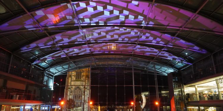 Purple projection on ceiling